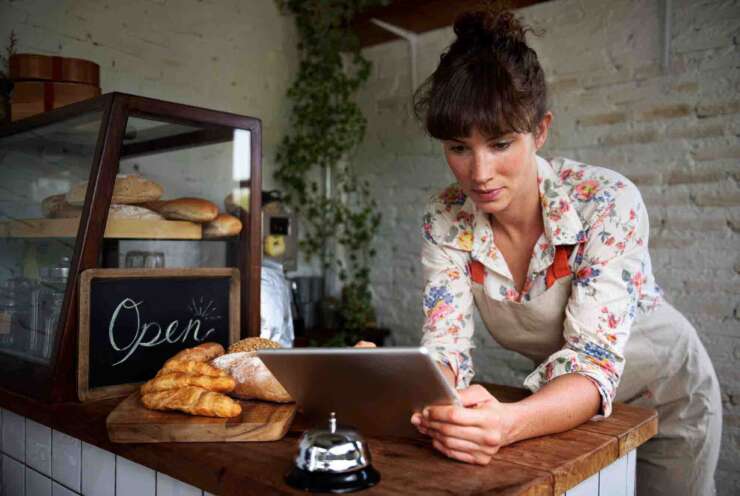 woman using digital tablet