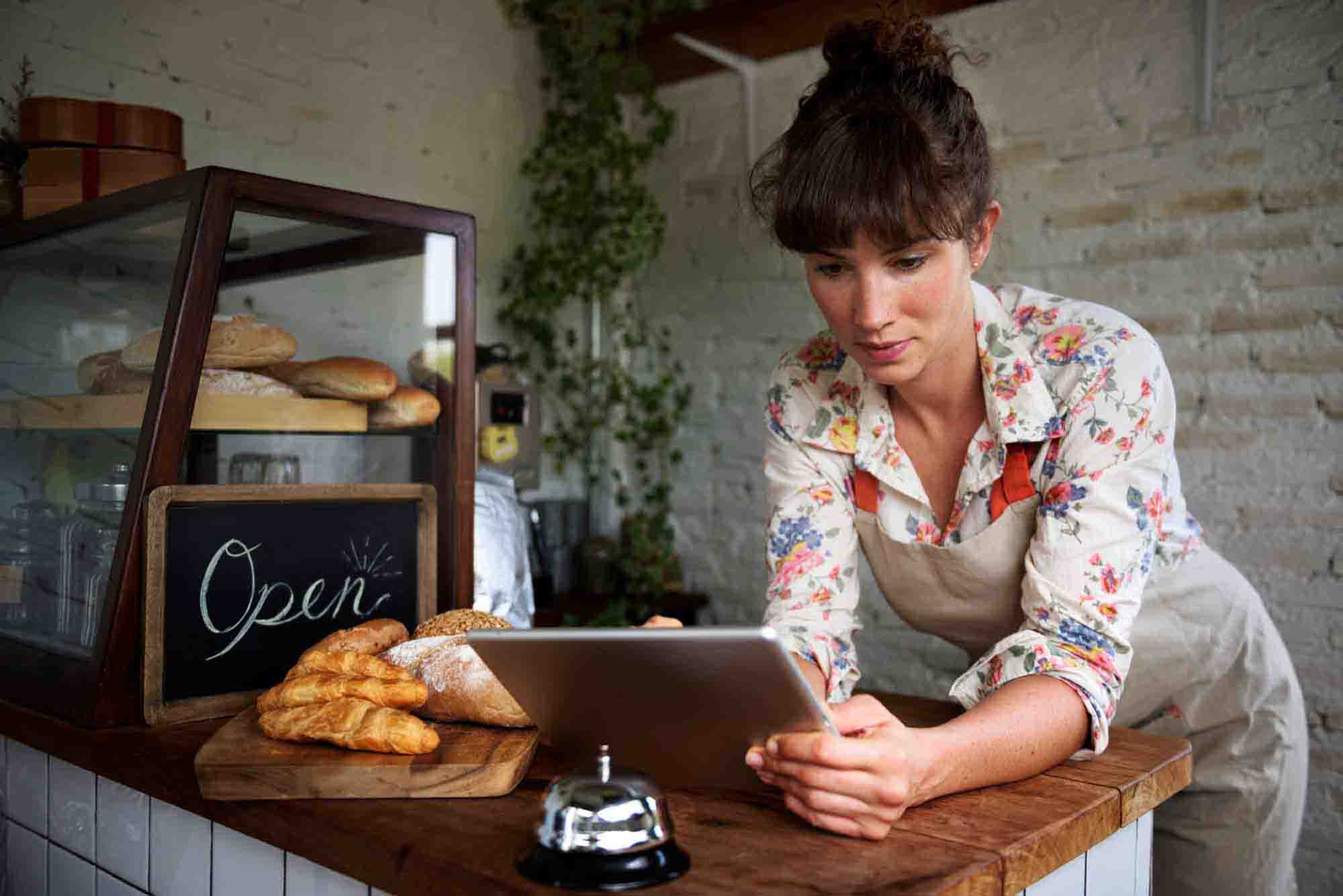 woman using digital tablet